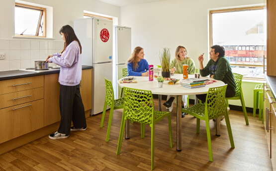 A group of students in student accommodation kitchen