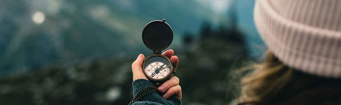 Woman using a compass