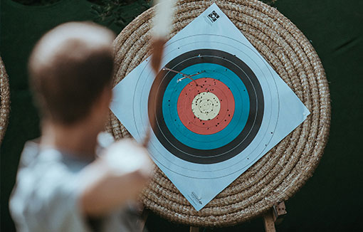 An archer aiming at a target