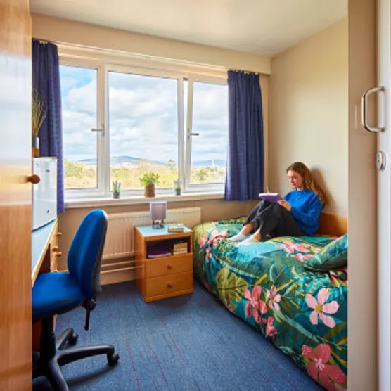 A photo of a student in an on-campus accommodation