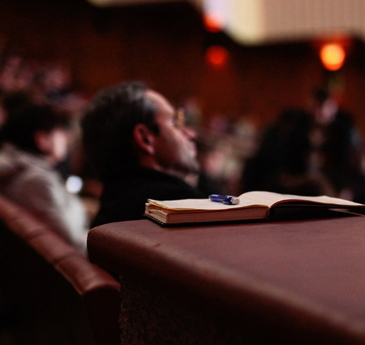 A lecture theatre with a notebook