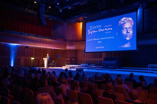 Photo of darkened stage at 2022 Dylan Thomas Prize award ceremony