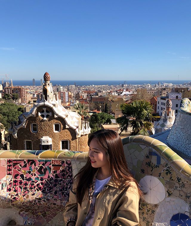 Student standing in front of overview of Barcelona