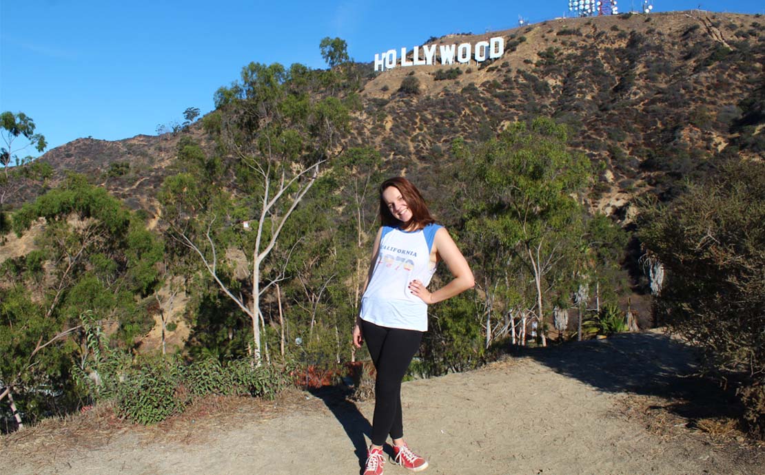 Kamile with the Hollywood sign in the background