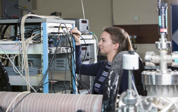 Physics student Lowri Galea working on equipment
