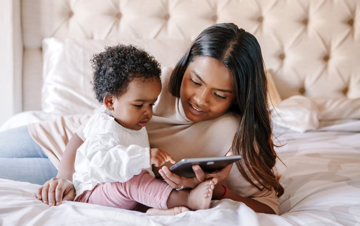 Toddler and mum using iPad