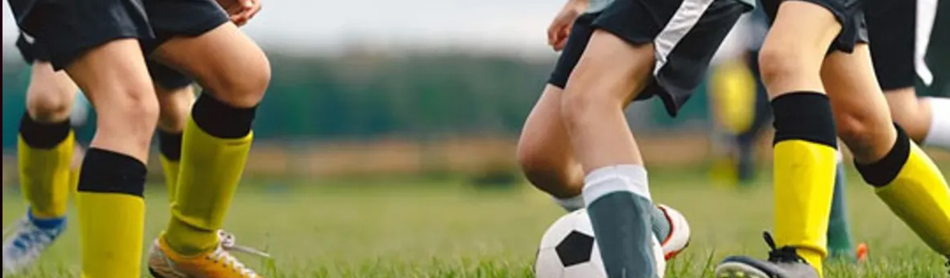 Girls playing football