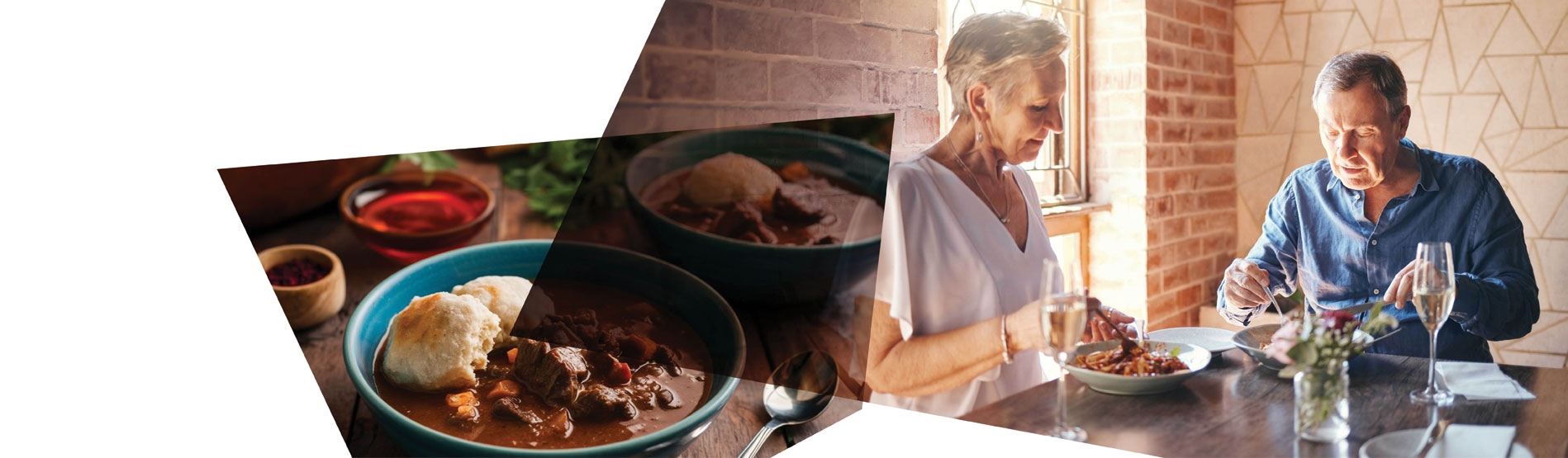 An older couple eating together alongside two bowls of stew and dumplings