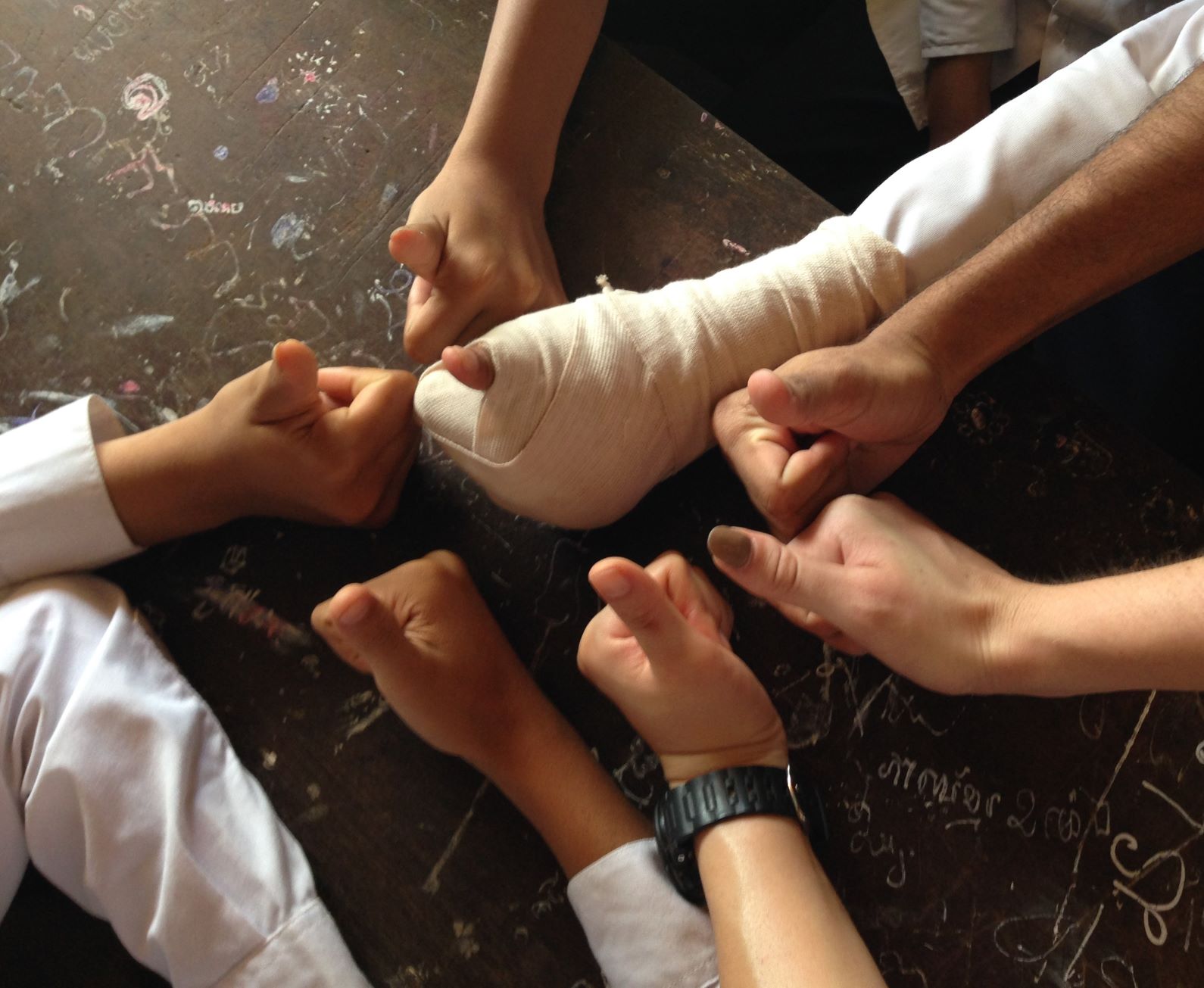 Students with their thumbs up