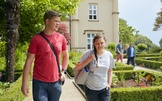 Students walking away from Singleton Abbey